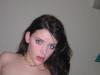 Brunette naked on bed