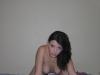 Brunette naked on bed